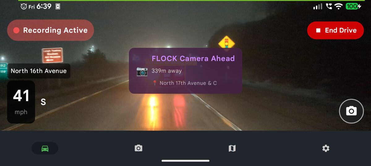Phone Dashcam FLOCK Camera Ahead alert at 41 mph in foggy conditions on North 16th Ave