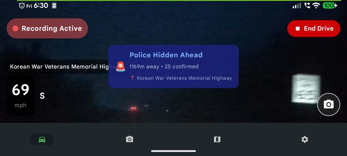 Phone Dashcam Police Hidden Ahead alert at 69 mph on Korean War Veterans Memorial Highway with 25 confirmed reports